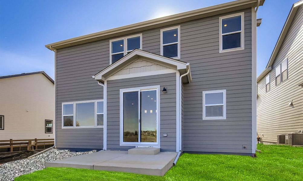 Exterior details and patio area of a home in Country Club Reserve – Fort Collins, Fort Collins (Image 4).