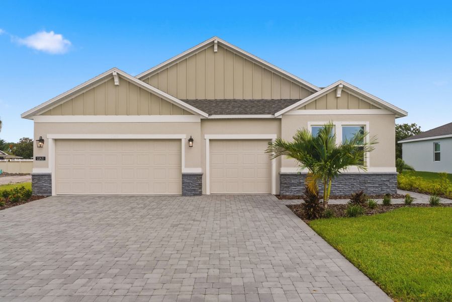 Front exterior of a new home in Country Club Estates, Palm Bay, FL, highlighting curb appeal (Image 1). Front exterior of a new home in Country Club Estates, Palm Bay, FL, highlighting curb appeal (Image 1).