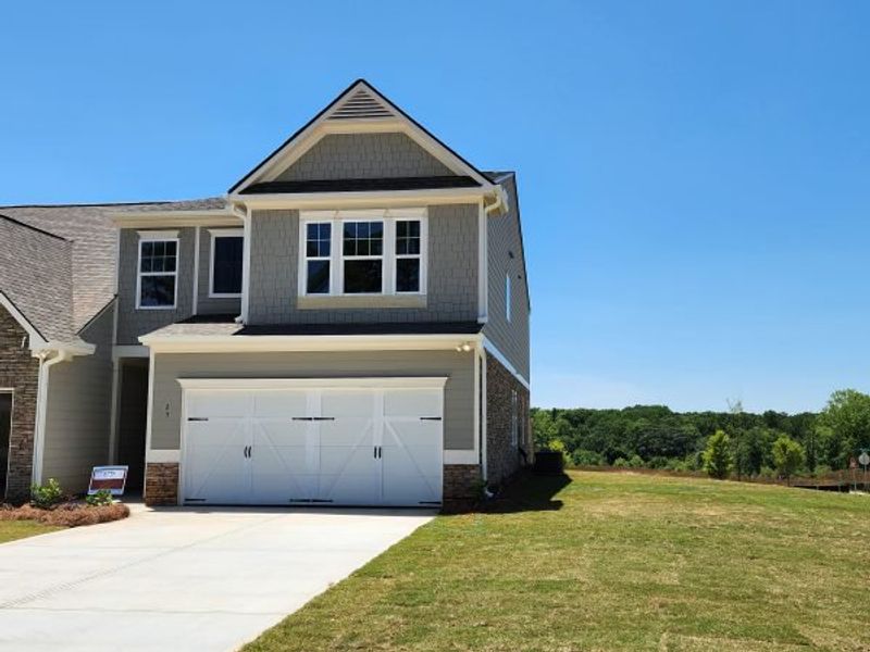 Representative exterior photo of a completed home built from the Springdale Townhome by Piedmont Residential in The Retreat at Browns Ridge, Newnan, GA (Image 30).