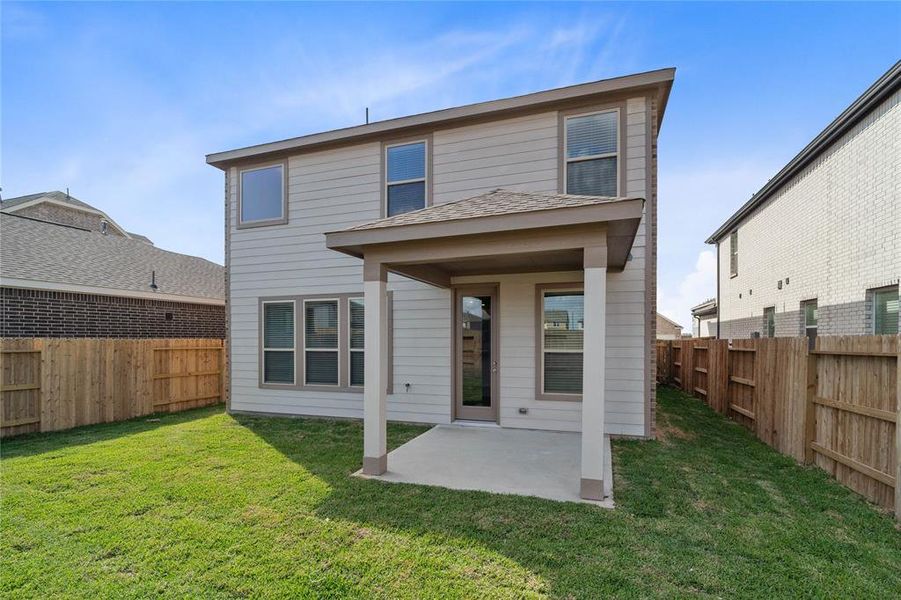 Come and see this spacious backyard with its beautiful covered patio. There is plenty of room for the kids to play and adults to relax!