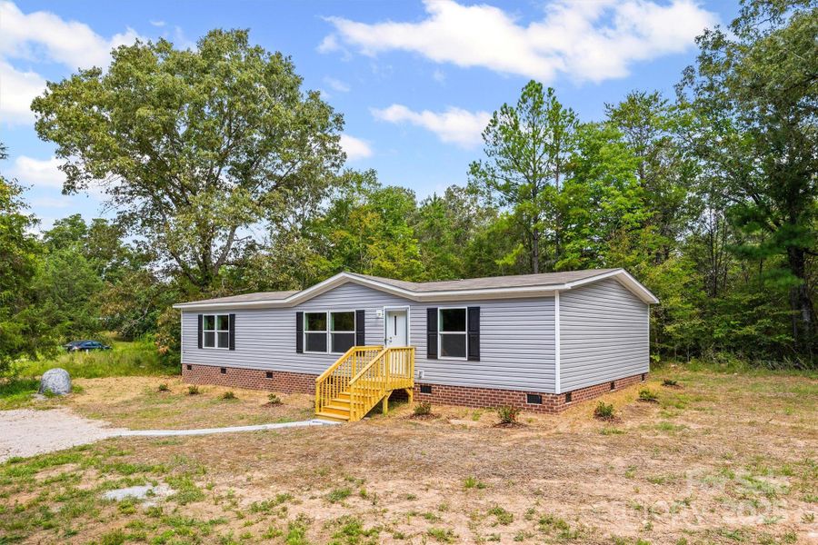 Front exterior of a new home in , Sharon, SC, highlighting curb appeal (Image 14). Front exterior of a new home in , Sharon, SC, highlighting curb appeal (Image 14).