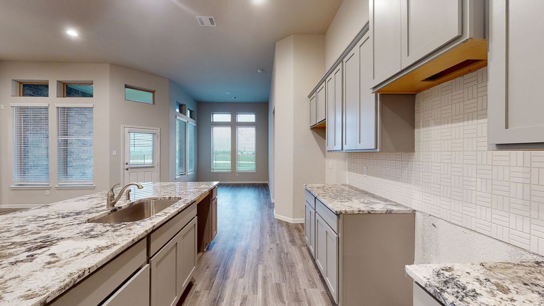 Representative furnished interior of a home built from the Floor Plan 2175 by Colina Homes in Grand Magnolia, Magnolia (Image 14).