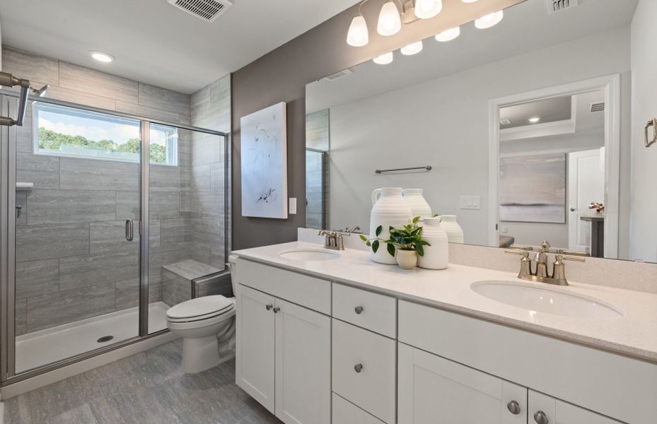 Furnished interior view inside a new home in Lakeside Townes at Riverlights, Wilmington (Image 10).