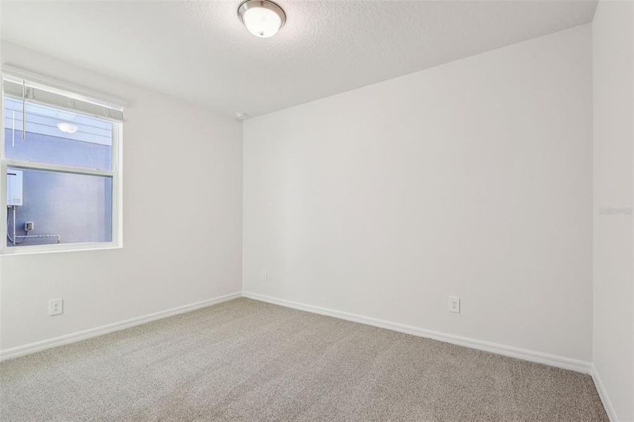 Spacious, unfurnished interior of a new home in The Reserve at Twin Lakes, St. Cloud (Image 19).