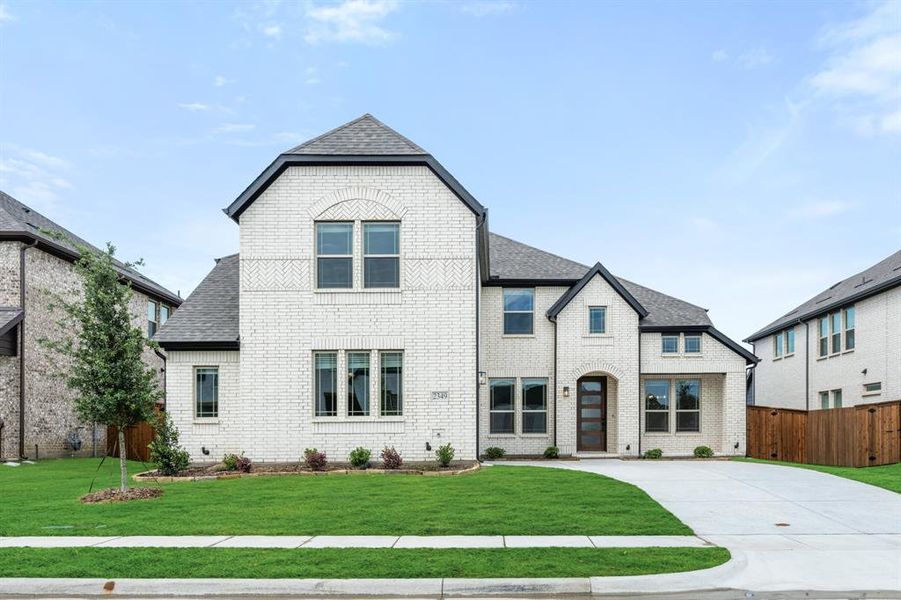 Front exterior of a new home in Sonoma Verde, Rockwall, TX, highlighting curb appeal (Image 21). Front exterior of a new home in Sonoma Verde, Rockwall, TX, highlighting curb appeal (Image 21).