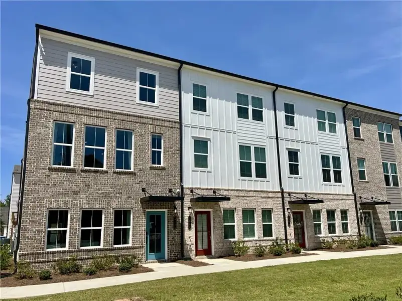 Condo located in Lawrenceville, GA showcasing its design and architecture (Image 1). Condo located in Lawrenceville, GA showcasing its design and architecture (Image 1).