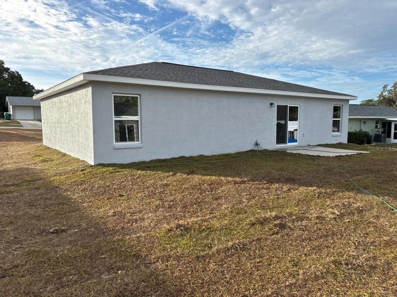 Exterior details and patio area of a home in , Citrus Springs (Image 21).