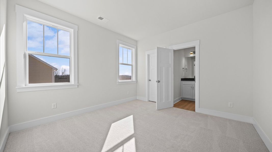 Furnished interior view inside a new home in Pinebrook, Woodruff (Image 38).