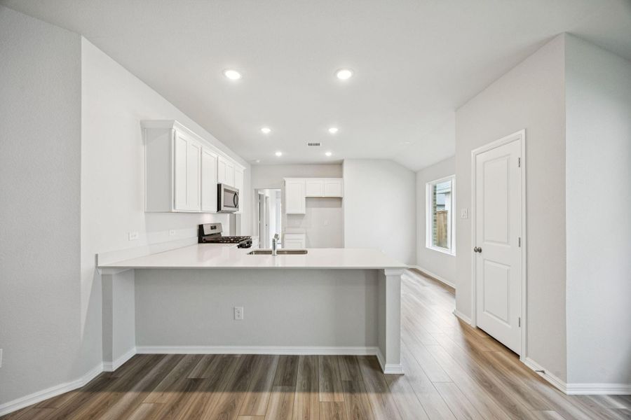 Furnished interior view inside a new home in Saint Tropez, Huffman (Image 4).