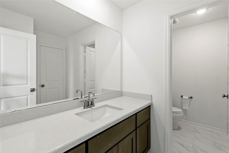 one of two second floor full baths