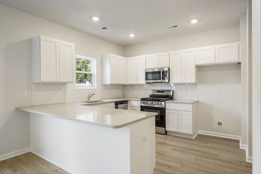 Furnished interior view inside a new home in Richmond Hill, Inman (Image 5).