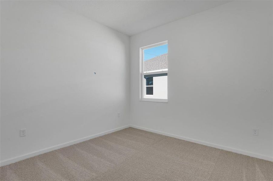 Spacious, unfurnished interior of a new home in Willowbrook North, Winter Haven (Image 19).