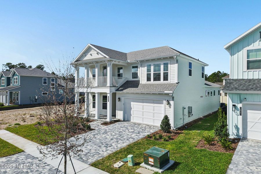 Front exterior of a new home in Nocatee, Ponte Vedra, FL, highlighting curb appeal (Image 34).