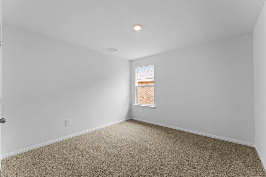 Spacious, unfurnished interior of a new home in Bar W Ranch, Leander (Image 19).