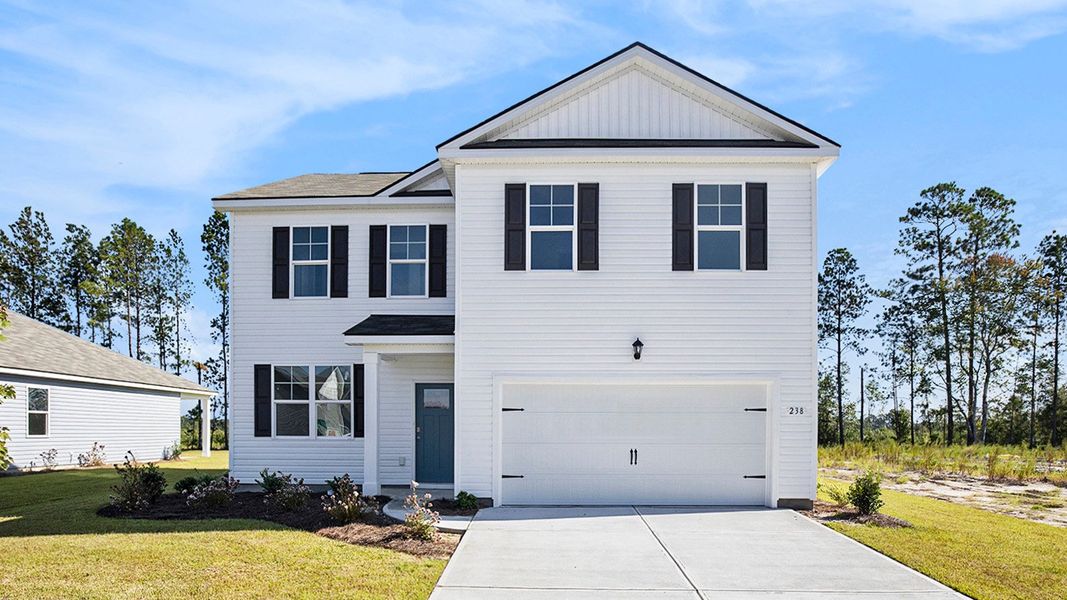 Front exterior of a new home in The Reserve at Wild Horse, Conway, SC, highlighting curb appeal (Image 1). Front exterior of a new home in The Reserve at Wild Horse, Conway, SC, highlighting curb appeal (Image 1).