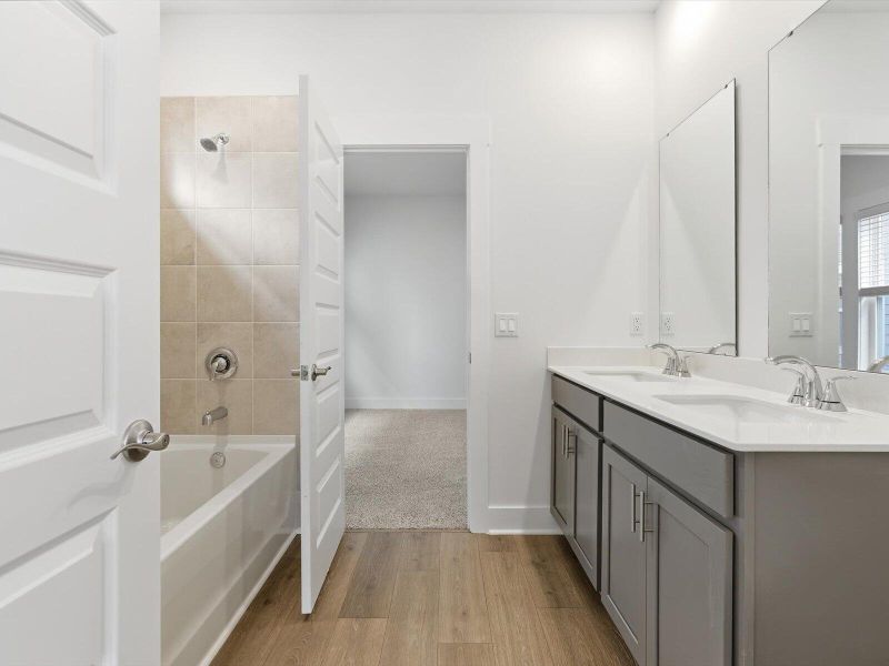 Furnished interior view inside a new home in The Coves at Lakes of Cane Bay, Summerville (Image 12).