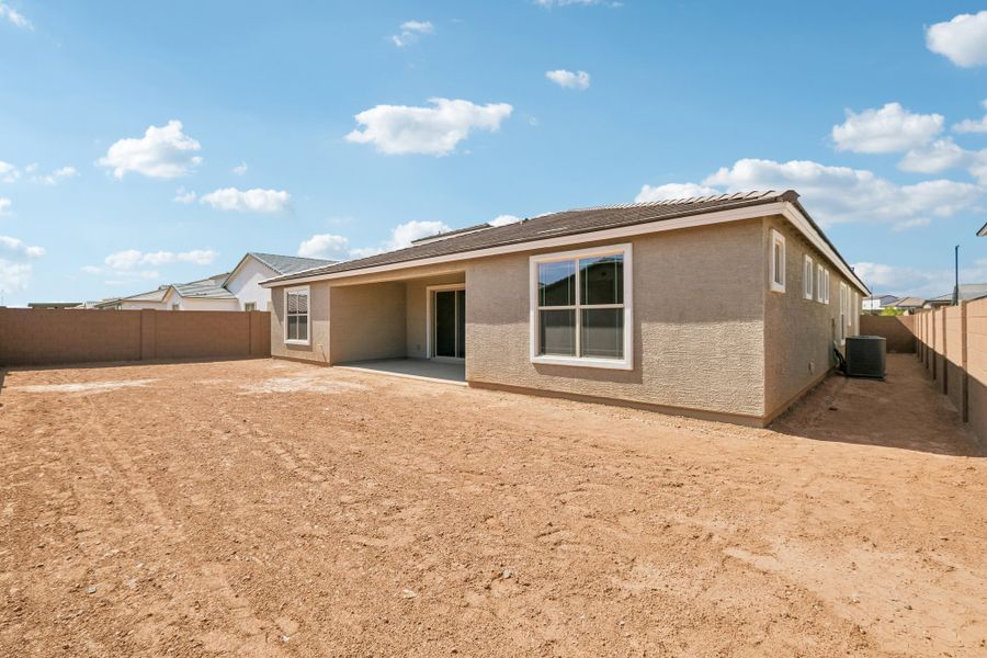Exterior details and patio area of a home in Artisan at Asante, Surprise (Image 4). Exterior details and patio area of a home in Artisan at Asante, Surprise (Image 4).