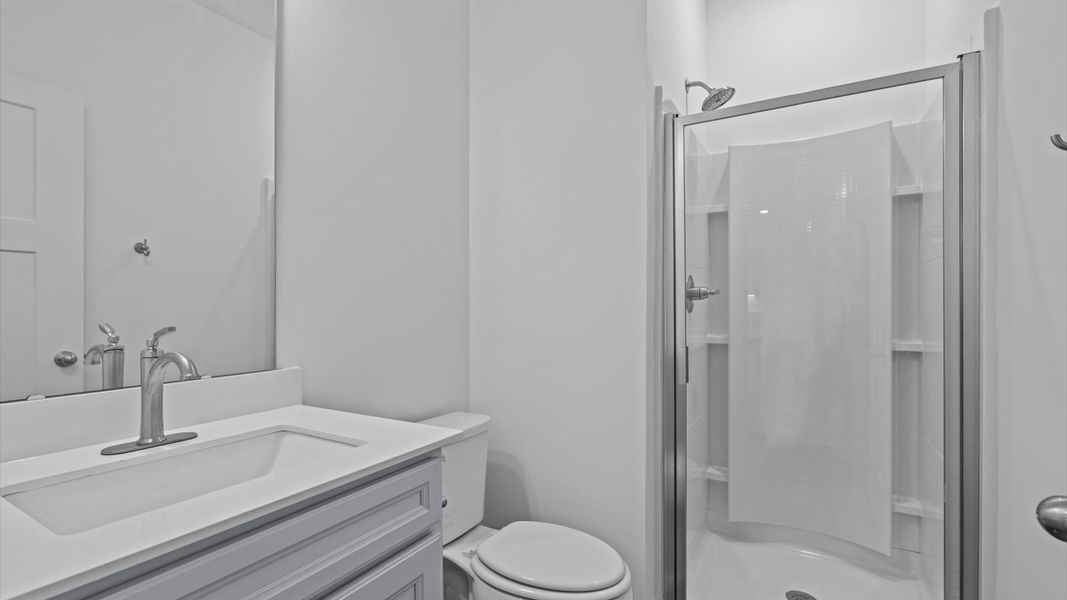 Accomplished full bath designed with both comfort and sophistication in mind