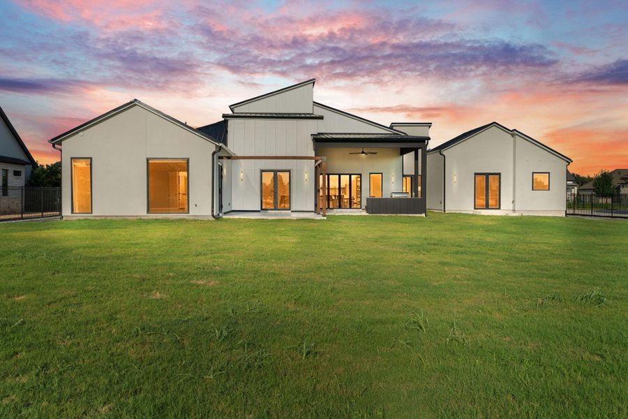 Front exterior of a new home in , Dripping Springs, TX, highlighting curb appeal (Image 26). Front exterior of a new home in , Dripping Springs, TX, highlighting curb appeal (Image 26).