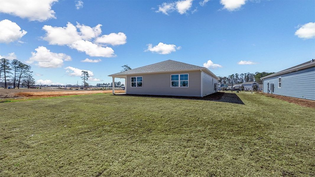 Front exterior of a new home in Sease's Pond, Gilbert, SC, highlighting curb appeal (Image 20). Front exterior of a new home in Sease's Pond, Gilbert, SC, highlighting curb appeal (Image 20).