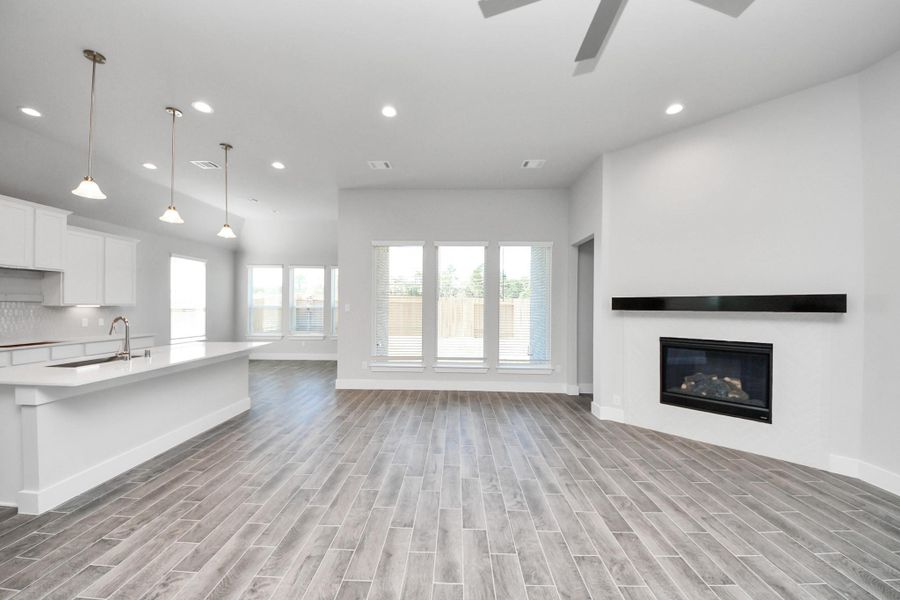Take another glimpse into the heart of the home with this additional view of the family room—a sprawling space ready to accommodate all your gatherings. Take another glimpse into the heart of the home with this additional view of the family room—a sprawling space ready to accommodate all your gatherings.