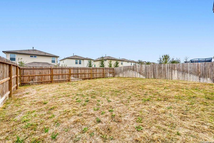 Exterior details and patio area of a home in Redbird Ranch, San Antonio (Image 3).