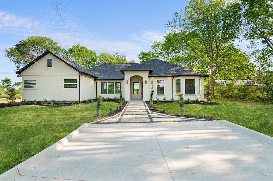 Front exterior of a new home in , Wills Point, TX, highlighting curb appeal (Image 6).