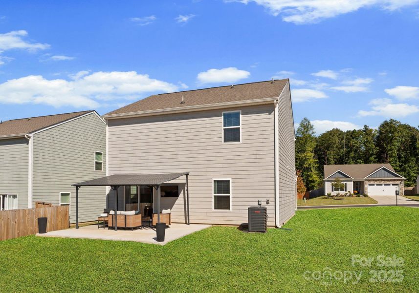 Exterior details and patio area of a home in , Troutman (Image 20).