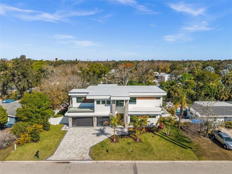 Front exterior of a new home in , Sarasota, FL, highlighting curb appeal (Image 26).