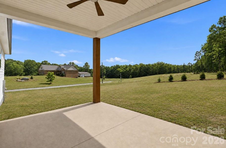 covered back patio w/ solid oak post & ceiling fan*yard virtually updated covered back patio w/ solid oak post & ceiling fan*yard virtually updated