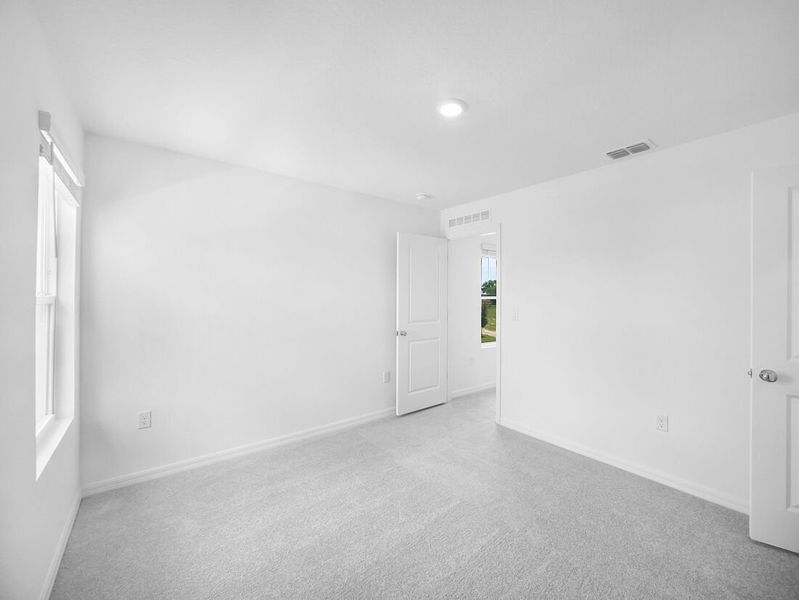 Representative unfurnished interior of a home built from the Azalea by Taylor Morrison in Waterstone, Groveland (Image 25).