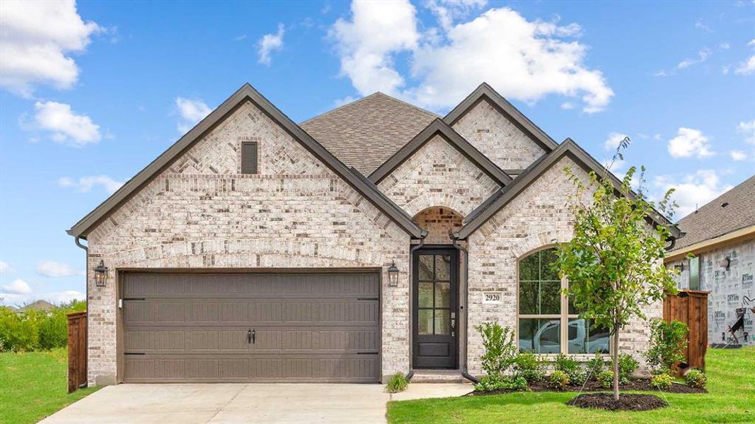 Front exterior of a new home in Devonshire - Reserve 45', Forney, TX, highlighting curb appeal (Image 18).