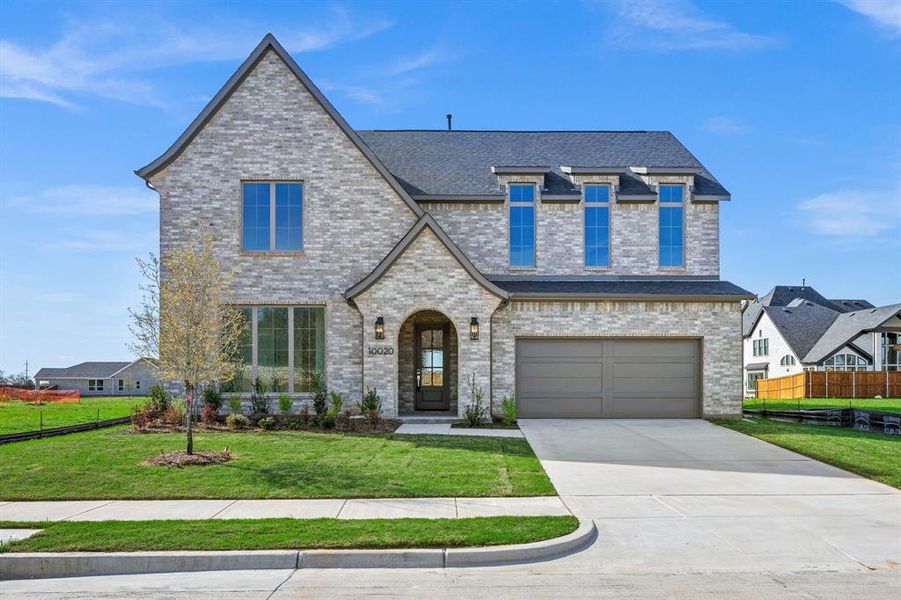 Front exterior of a new home in Chatham Reserve, Providence Village, TX, highlighting curb appeal (Image 1). Front exterior of a new home in Chatham Reserve, Providence Village, TX, highlighting curb appeal (Image 1).