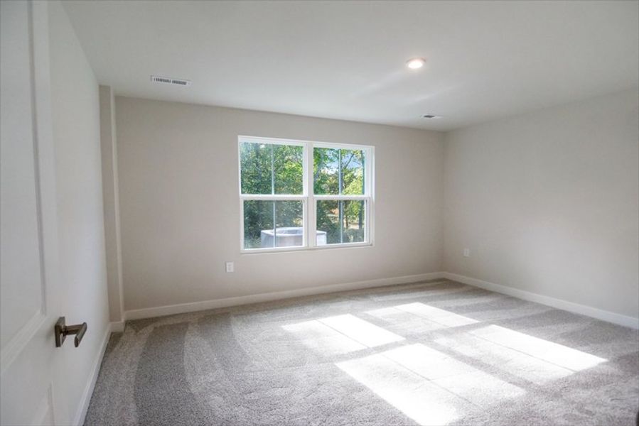 Spacious, unfurnished interior of a new home in Arden Woods Villas, Greenville (Image 11).