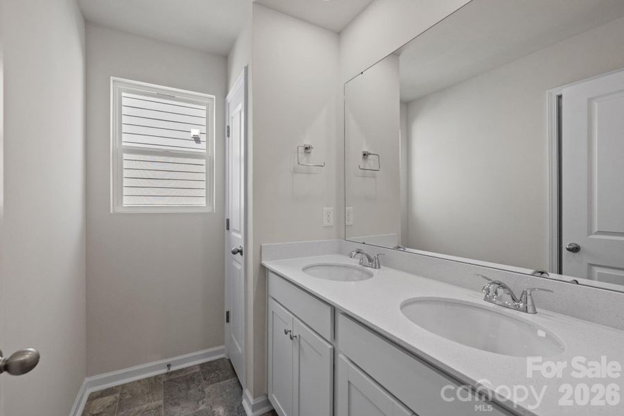 Furnished interior view inside a new home in McFarland Estates, York (Image 10).