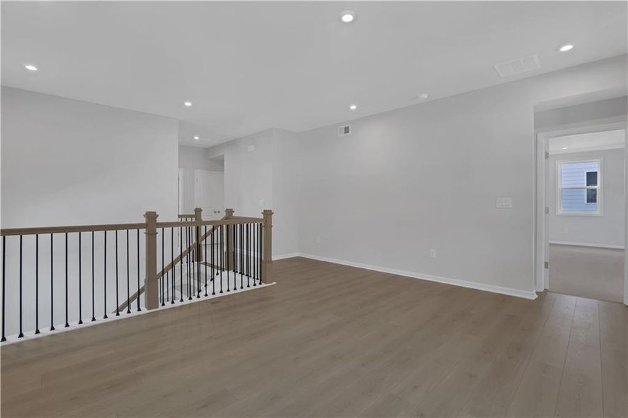 Spacious, unfurnished interior of a new home in The Paddocks at Doc Hughes, Buford (Image 43).