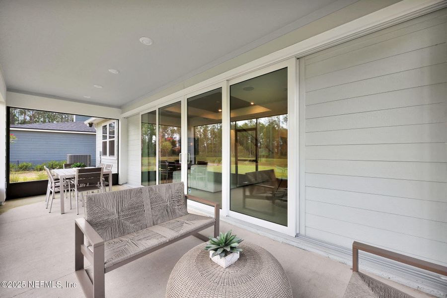 Exterior details and patio area of a home in Westerly Park at Wildlight, Yulee (Image 2).