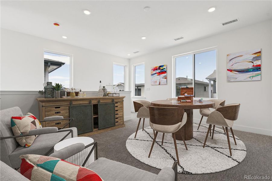 Furnished interior view inside a new home in Storytellers at Lyric, Lone Tree (Image 14).