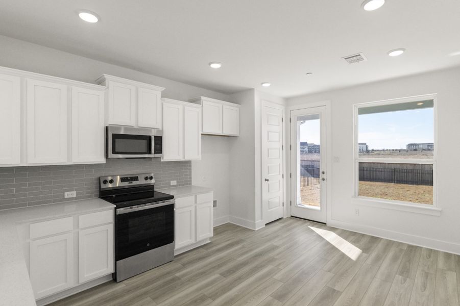 Furnished interior view inside a new home in Avery Centre, Round Rock (Image 7).