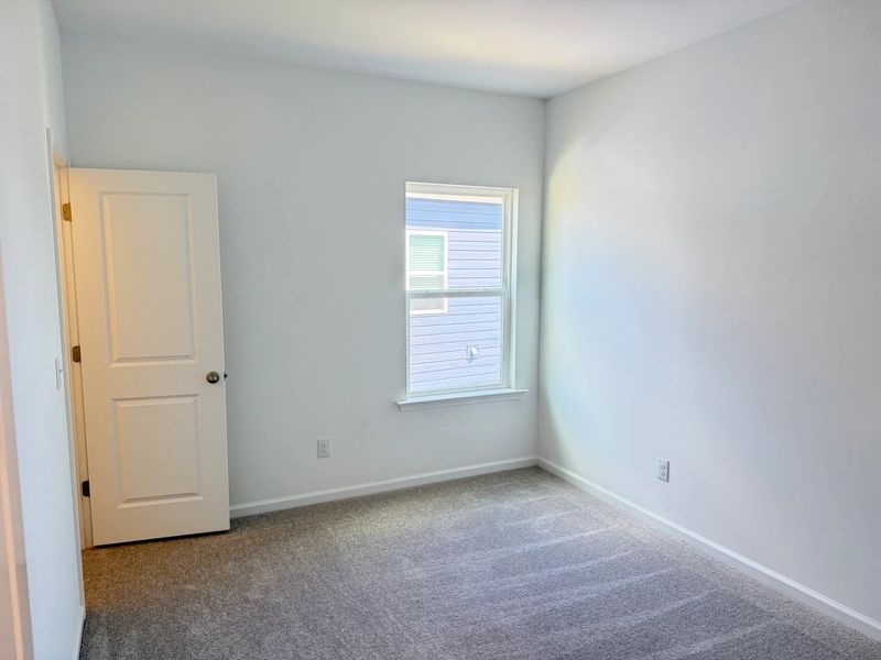 Spacious, unfurnished interior of a new home in Rowland's Grant, Fuquay Varina (Image 23).