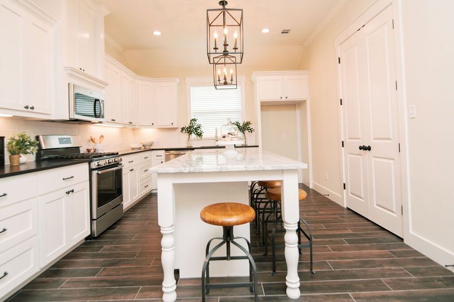 Representative furnished interior of a home built from the The Ashley by Reece Homes in Harvest Meadows, Bryan (Image 4).