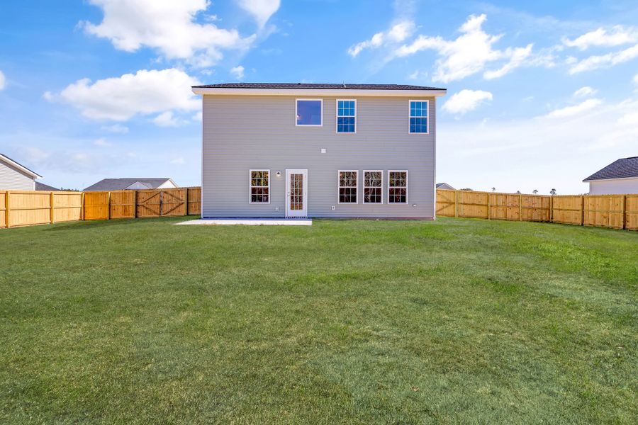 Representative exterior photo of a completed home built from the The Bagley by RTS Homes in Grand Reserve, Hinesville, GA (Image 18).