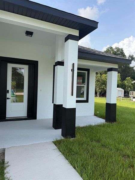 Exterior details and patio area of a home in , Summerfield (Image 3).