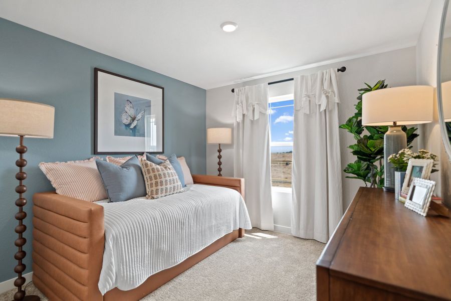 Representative furnished interior of a home built from the 4006 by Risewell Homes in Mead Crossing, Mead (Image 22).