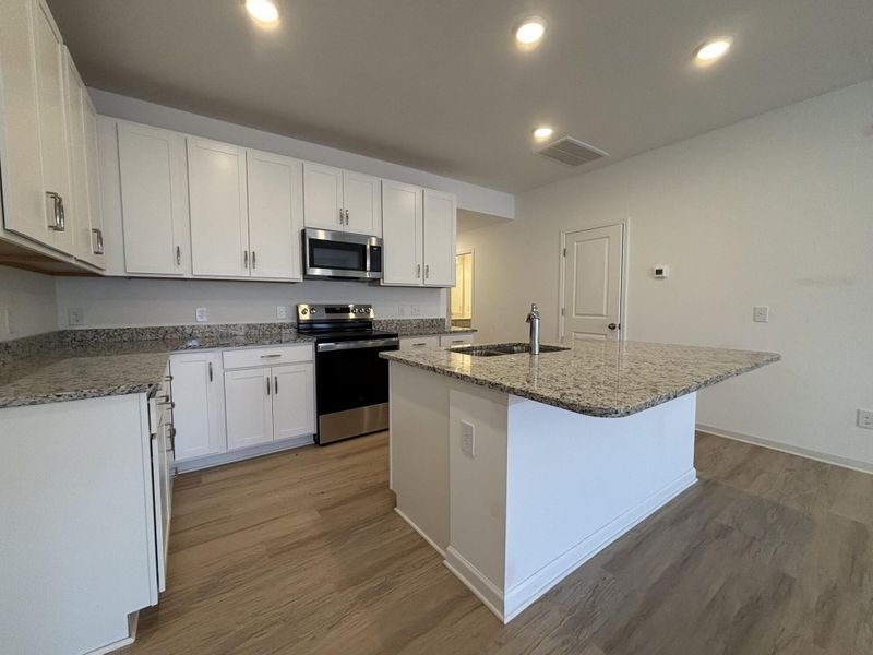 Furnished interior view inside a new home in CraigStone, Woodruff (Image 4). Furnished interior view inside a new home in CraigStone, Woodruff (Image 4).