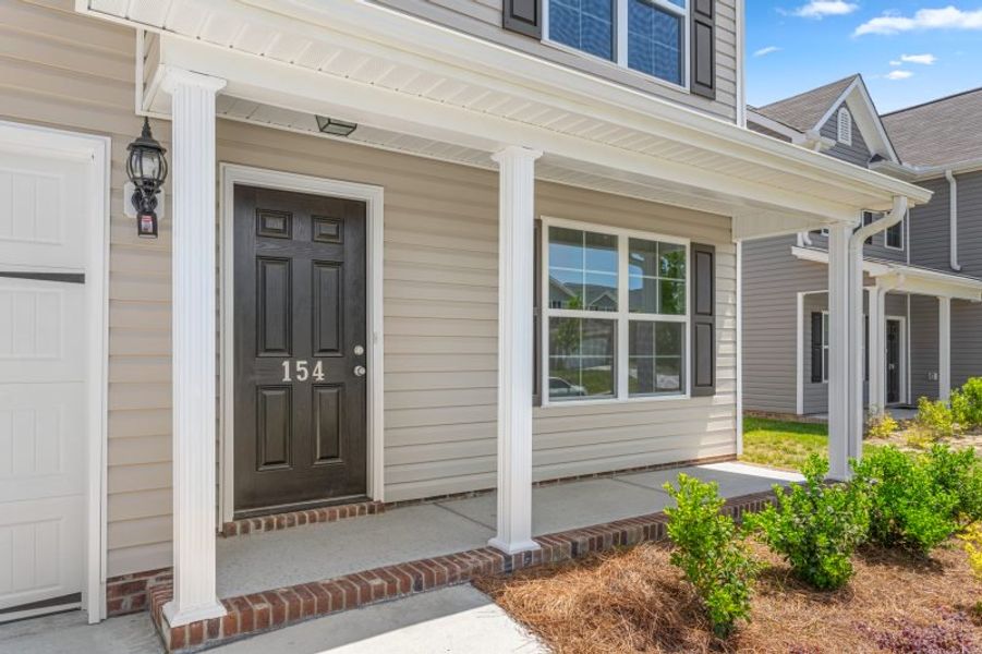 Representative exterior details of a home built from the Vermont by Keystone Homes NC in Brassfield Meadows, Burlington (Image 3). Representative exterior details of a home built from the Vermont by Keystone Homes NC in Brassfield Meadows, Burlington (Image 3).
