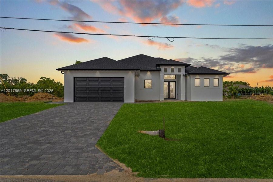 Front exterior of a new home in , Cape Coral, FL, highlighting curb appeal (Image 6).