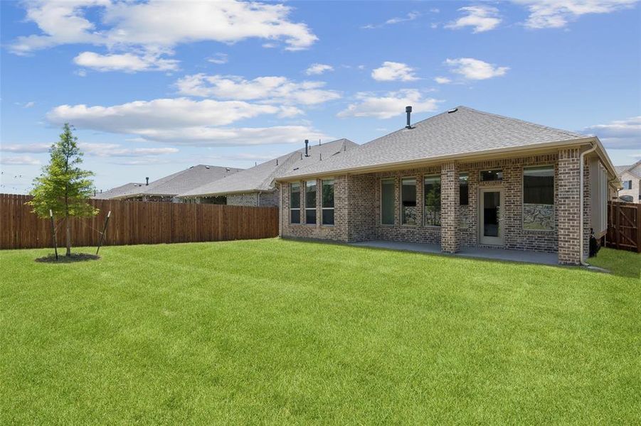 Front exterior of a new home in Northlake Estates: Brookstone Collection, Little Elm, TX, highlighting curb appeal (Image 26).