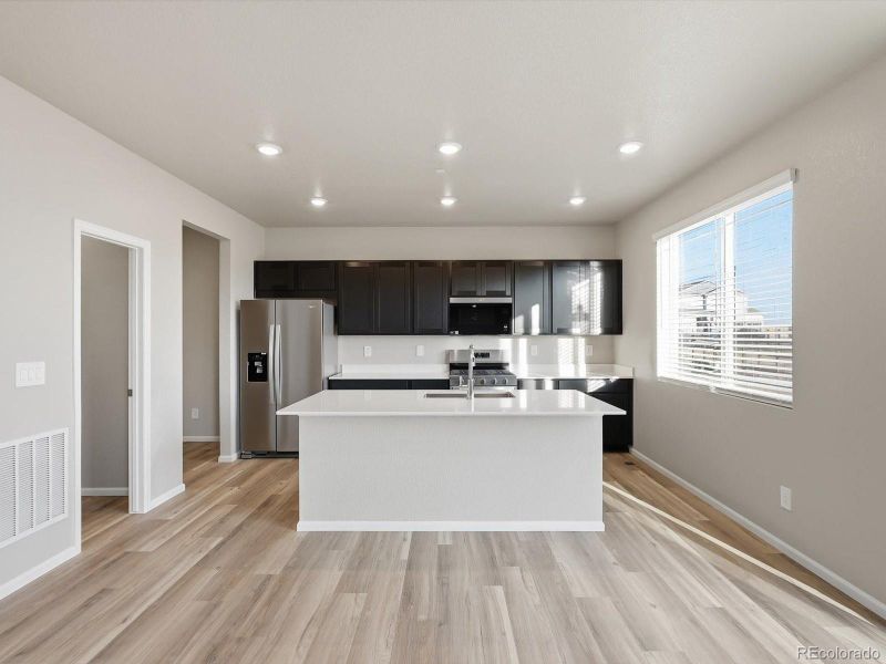 Furnished interior view inside a new home in , Commerce City (Image 9).