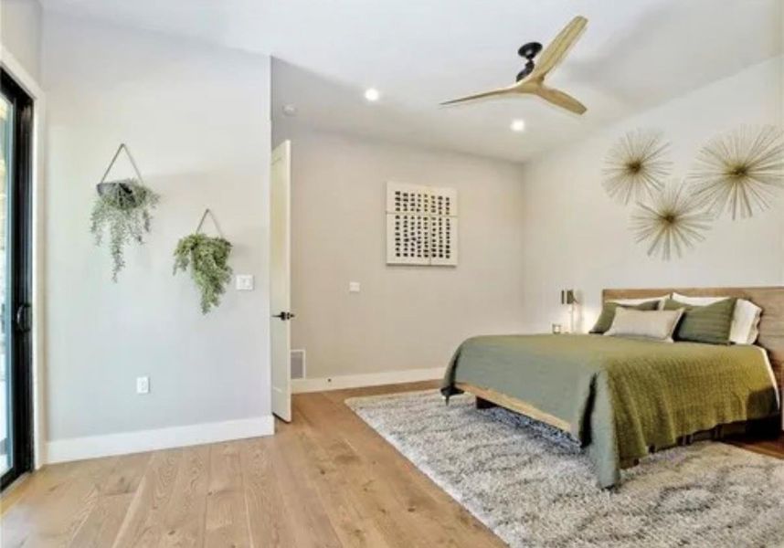 Bedroom featuring light wood-style flooring, recessed lighting, and ceiling fan Bedroom featuring light wood-style flooring, recessed lighting, and ceiling fan